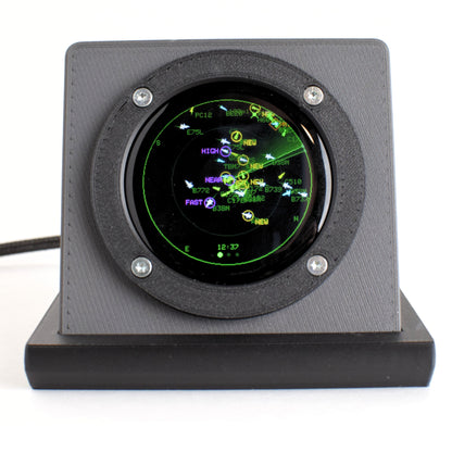 Blipscope live aircraft radar in Nardo grey, rear three-quarter view showing the debossed logo, weighted black base and braided USB cable